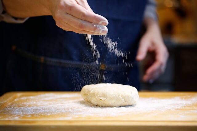 Rolling dough, flour and dough, making steak & mushroom pie