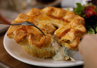 Cutting into a Chicken Pot Pie at Ginger and Baker